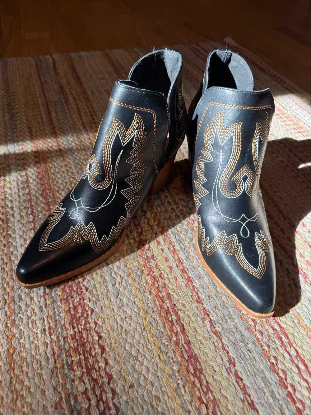 Black Western-Style Ankle Boots with Gold Stitching